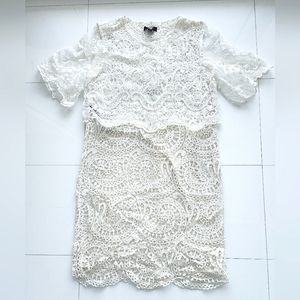 Burberry lace sheath dress with delicate lace overlay.  Made in Italy.  Size 6